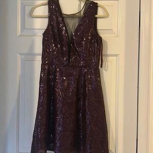 Sequin Max Azria dress. Cut low but mesh in front.